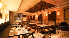 V Five Hotel - warmly lit up restaurant - Fifth sense