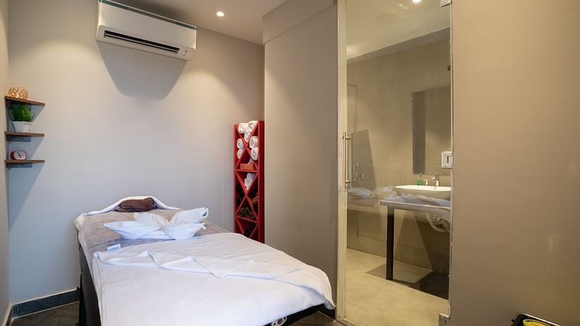 image of the spa featuring an air conditioned room with a wide bed at sibaya beach resort, morjim beach