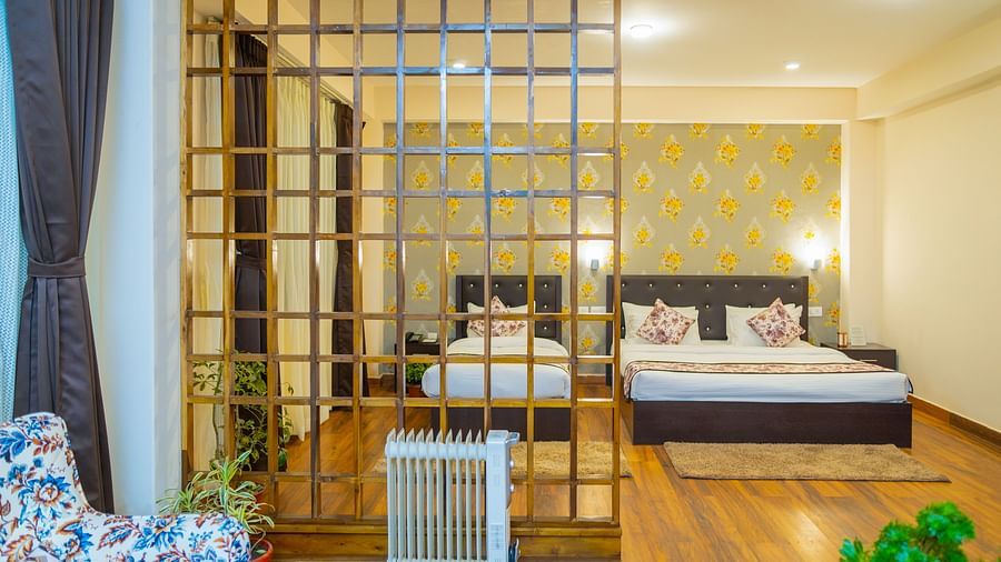 Dream Villa Retreat, Pelling - The interiors of the Suite with the bedding in the sleeping area