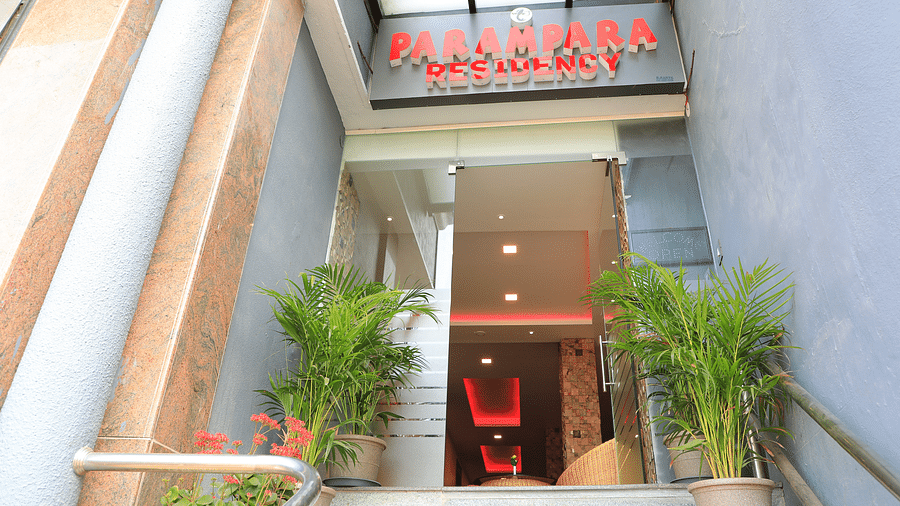 Entrance of Parampara Residency, Kushalnagar with Parampara Residency written above the door.