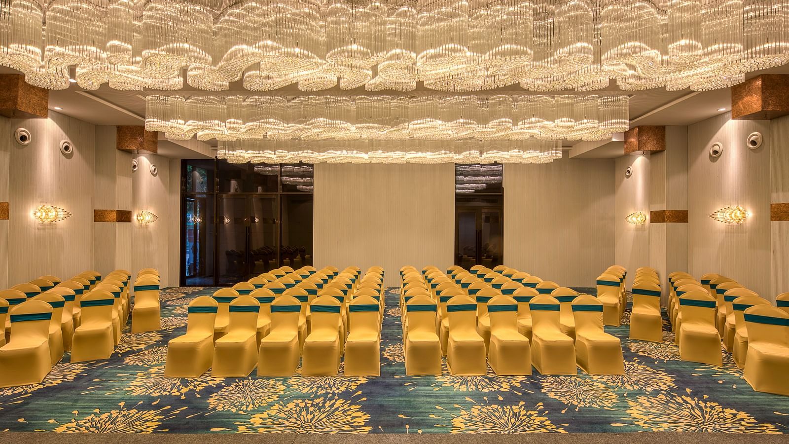 Yellow coloured chairs in the Sumo Anaika Banquet Hall at Le Foliage by TGI, Bangalore