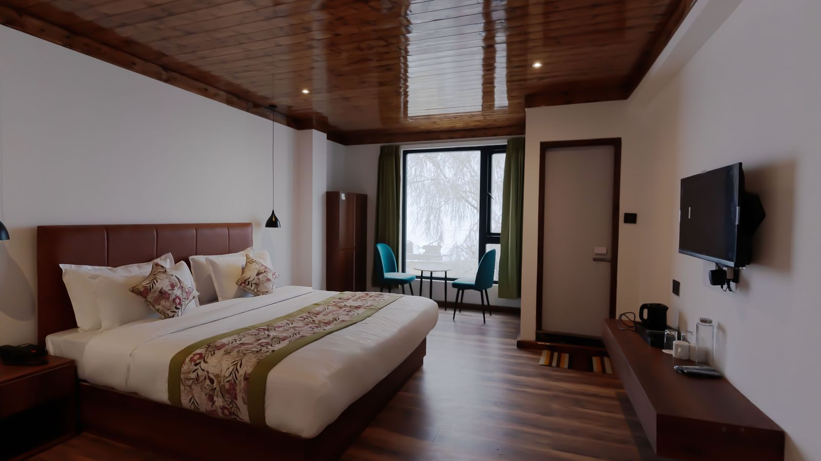 view of the premium room with large bed at Mystique Valley Resort  
