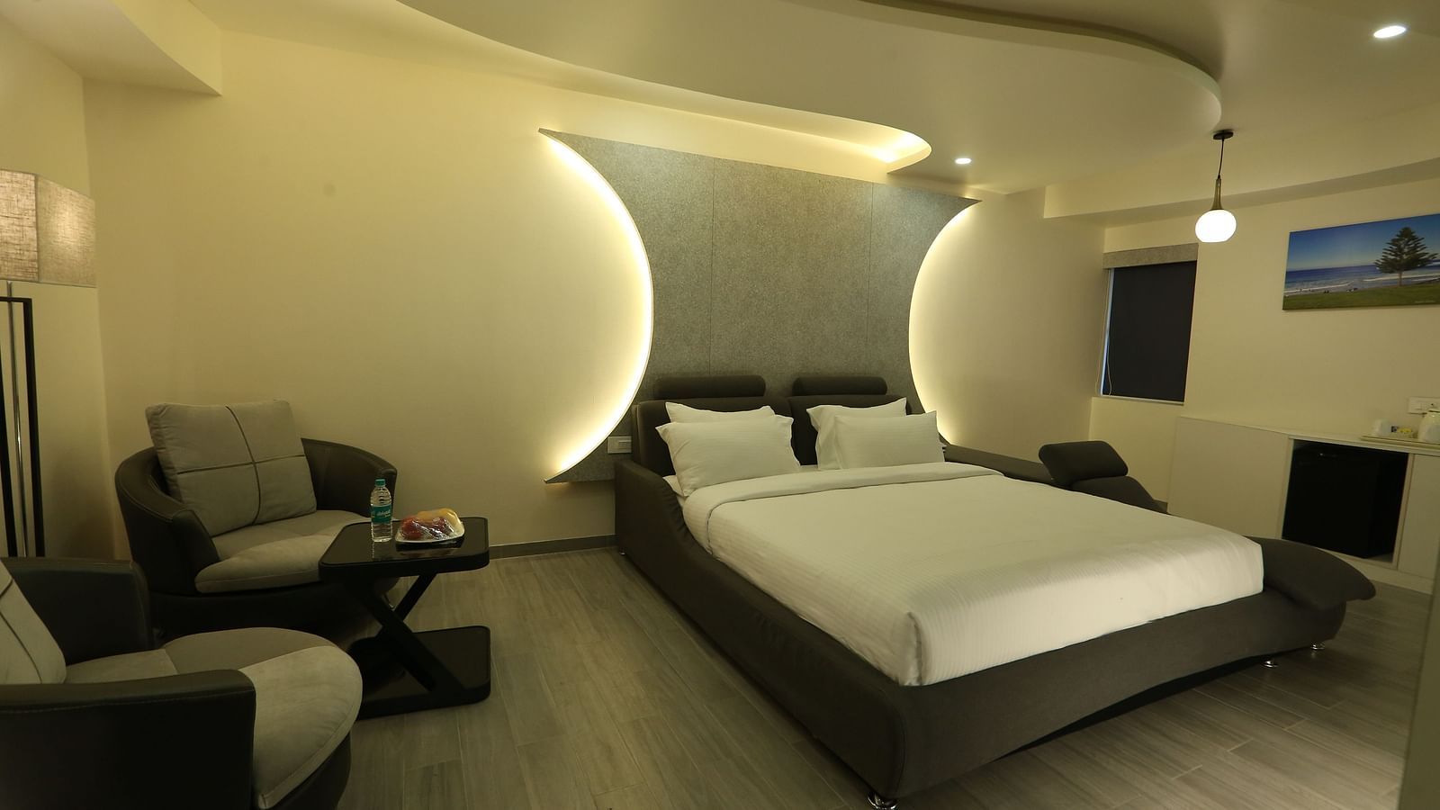 A view of Club Suite with a focus on the king size bed taken from near the entrance - TGI SPS Grand, Coimbatore