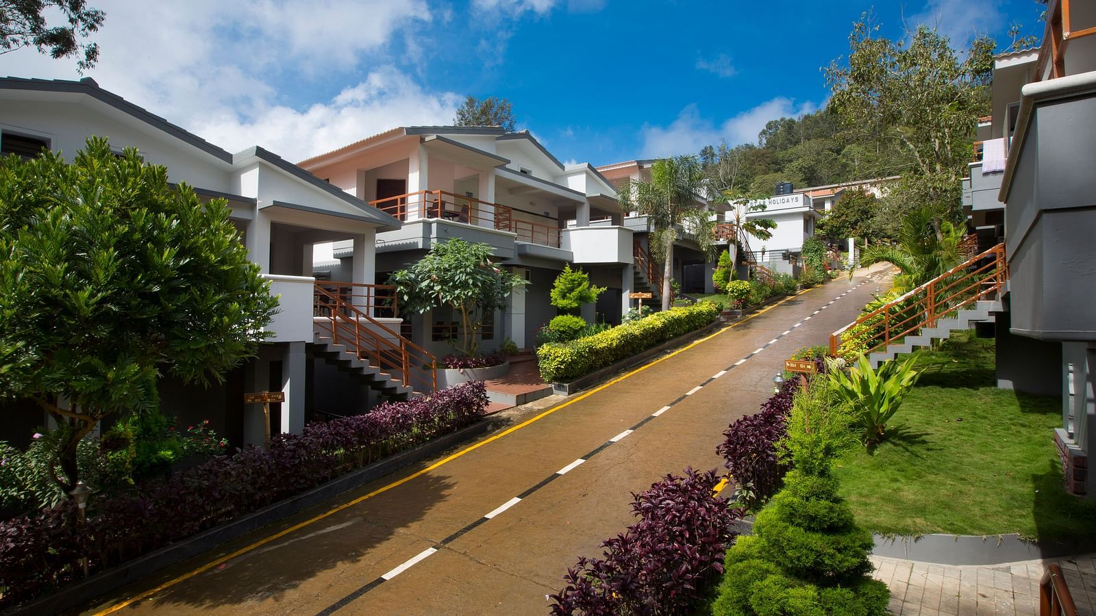 Exterior of TGI Star Holiday Resort on a clear blue day