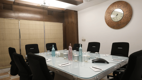 A private boardroom featuring a central conference table, executive seating, and modern meeting facilities designed for discussions, planning sessions, and intimate gatherings | Clarks Amer, Jaipur