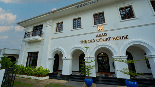 facade image of the old court house by abad, fort kochi