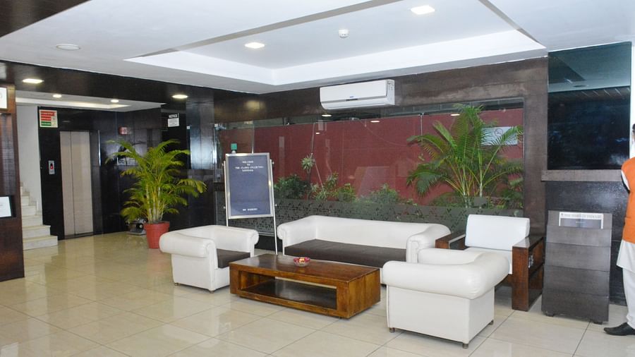 Side angle view of the lobby with couch and reception area - Clarks Collection, Vadodara