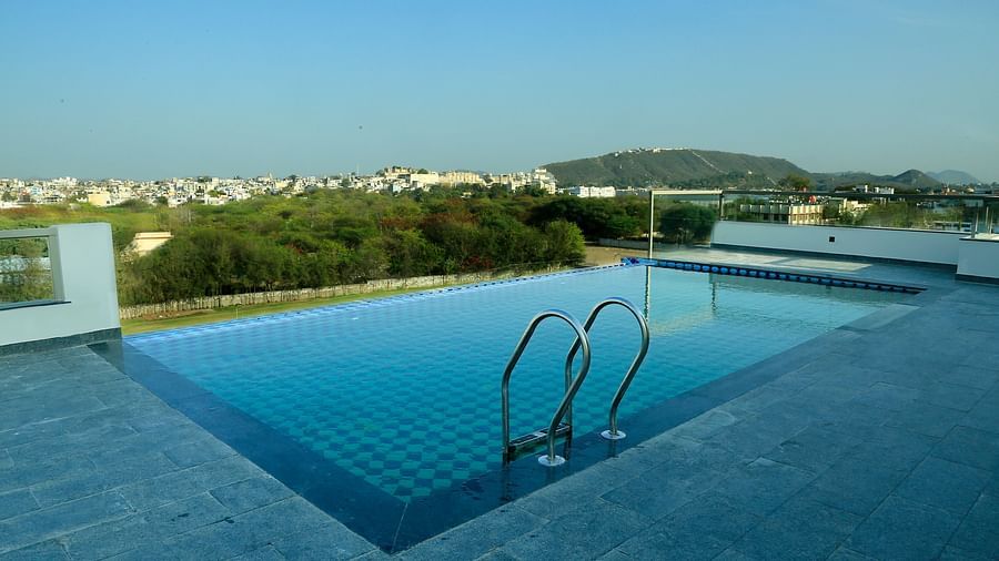 the swimming pool at the terrace of the hotel in Udaipur - Hotel Bawa, Udaipur 1