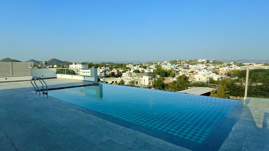 the swimming pool at the terrace of the hotel in Udaipur - Hotel Bawa, Udaipur