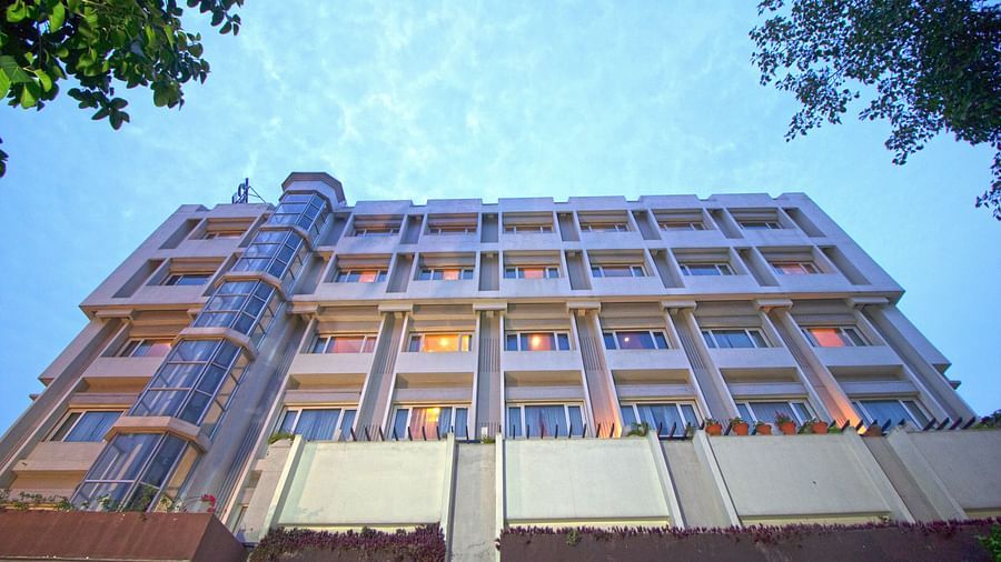 IRA Hotel Bhubaneswar huge building with soften pastel colour exterior and big window panes 