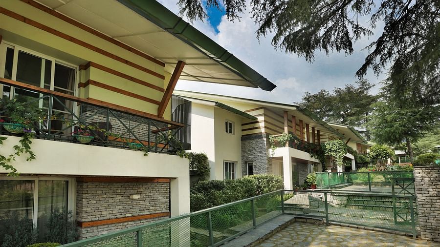 Exterior view of parking area and entrance to villas at lamrin norwood green captured during the day2