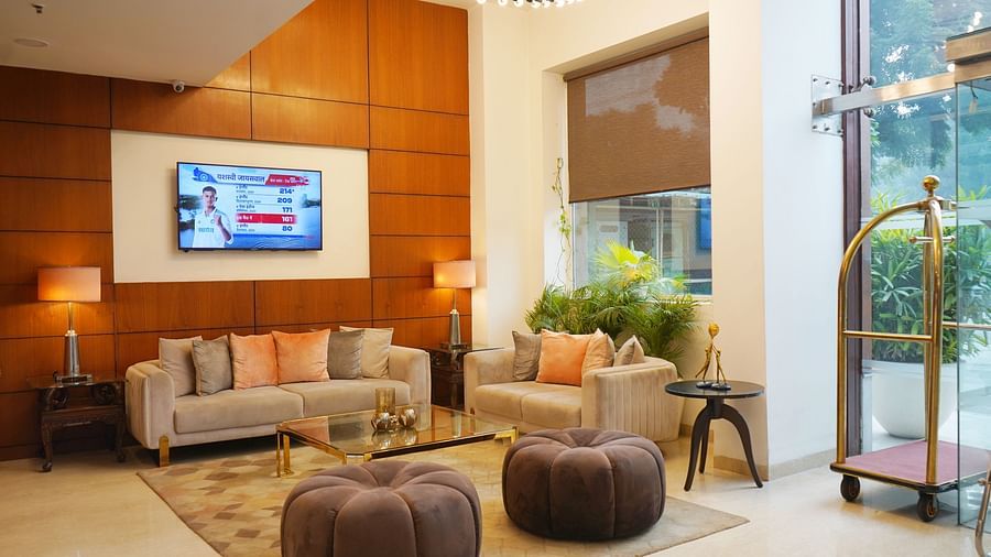 Inviting lobby at Nemesia with comfortable seating, stylish decor, and natural light.