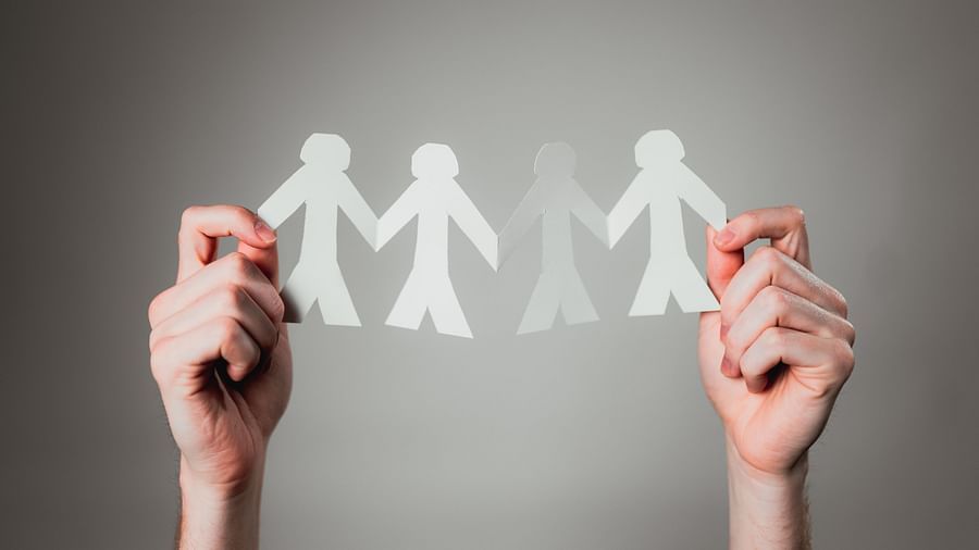 A paper with people shown across