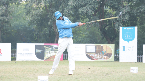 An image of a man playing golf at the golf course on the game day - Heritage Village Resorts & Spa
