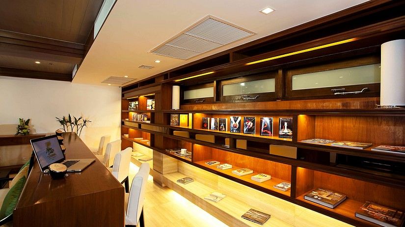 side view image of the business centre and the library with several books on display - Maikhao Dream Villa Resort & Spa, Phuket