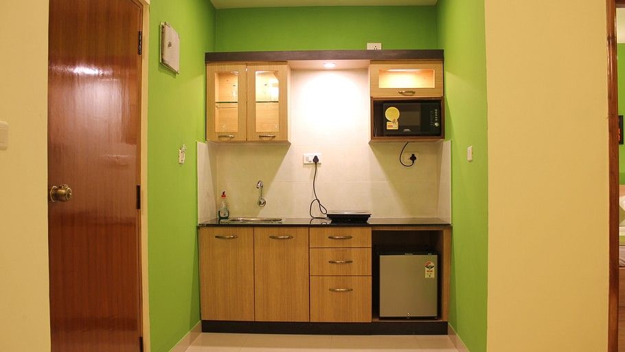 Hotel Arama Suites Bangalore kitchenette 1 aura suite  hotel arama suites bangalore