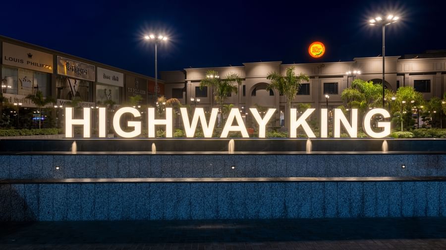 Large illuminated Highway King sign at Hotel Highway King, Kishangarh.