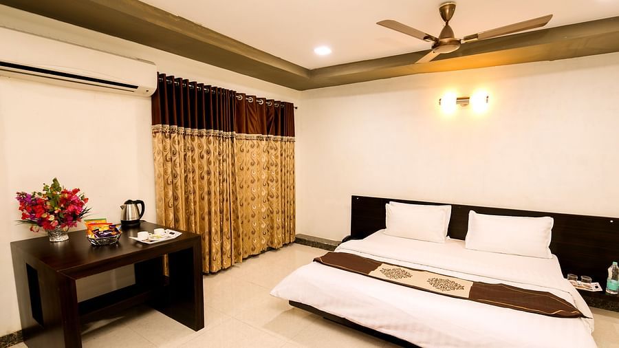 A room with with a double bed and work desk at Saavaj Resort