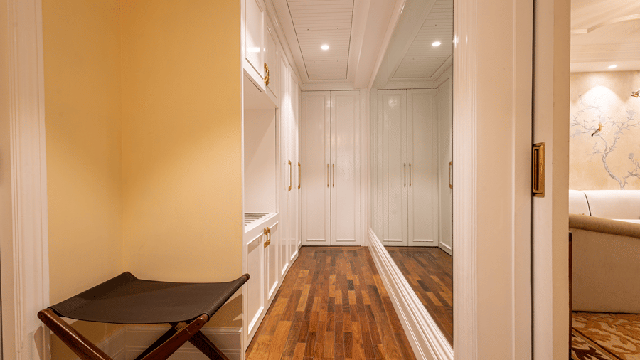 image of the walk in closet with wooden flooring at our lutyens luxury suite - The Claridges New Delhi