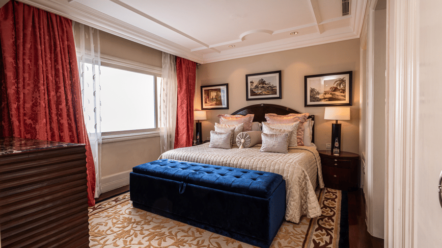 image of the bedroom at our regent suite from a corner angle with a lot of natural light coming from the window -  The Claridges New Delhi
