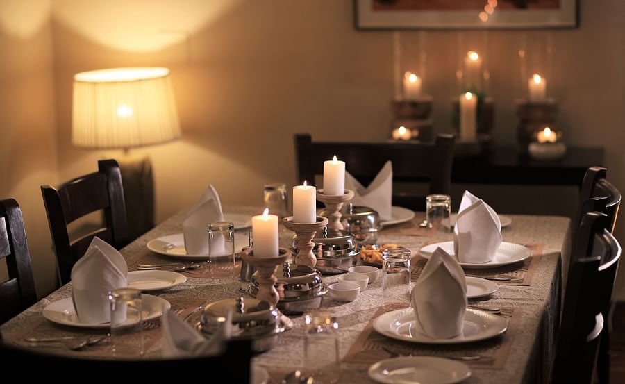 alt-text The dining table prepped for a meal 1 - Lamrin Boutique Cottages Rishikesh