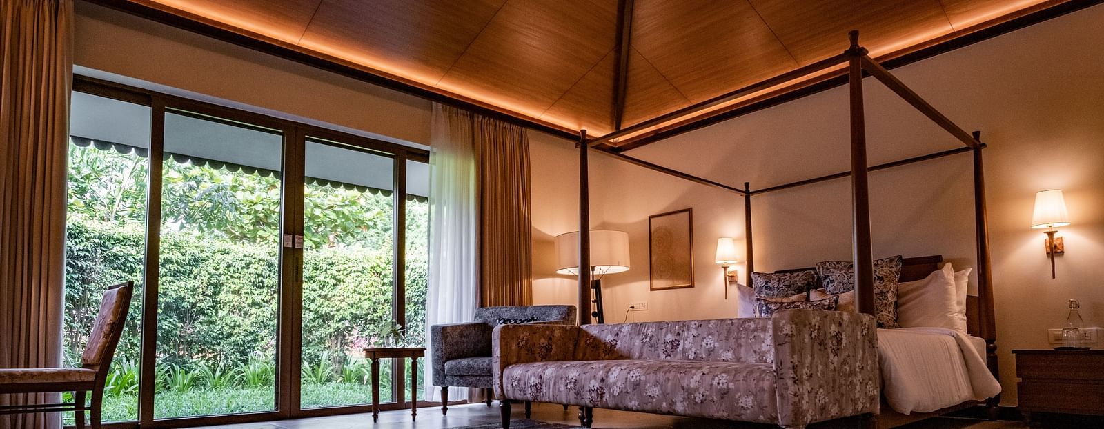A double bed with lamps above the bed inside the Premium Superior room - Gamyam Resort