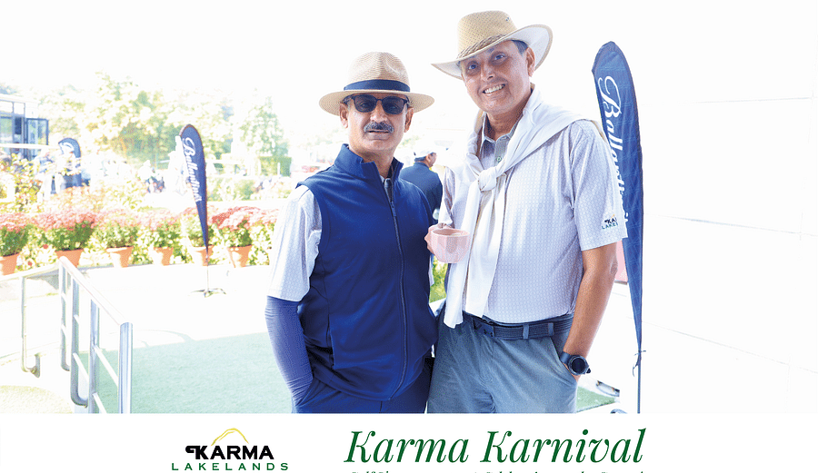 two men posing for the picture at  the golf event