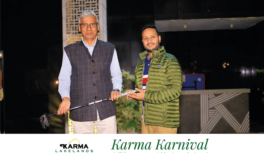 Picture of a person handing over the club to another.