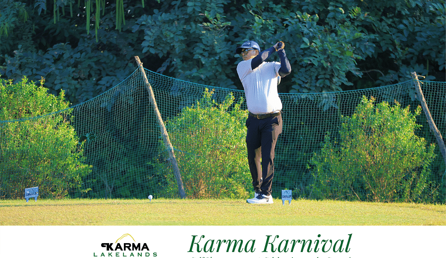 Picture of a person holding the club after the swing.