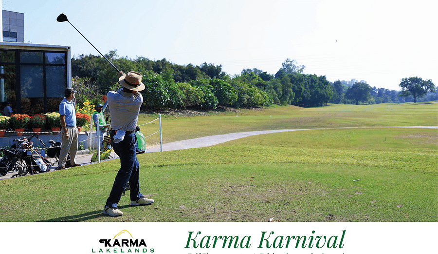 Picture of a  man swinging the driver at the tournamnet - Karma karnival