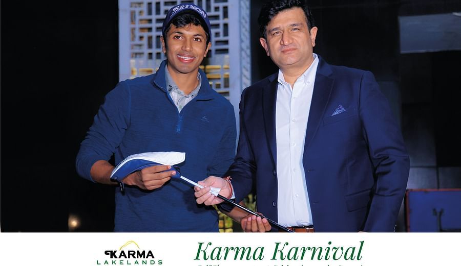 Picture of a person handing over the club to another.