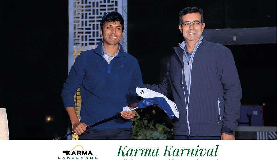 Picture of a person handing over the club to another.