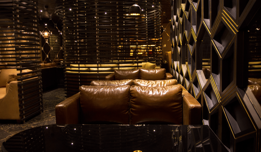sofas inside the Lounge at Alchemy, our in-house bar in Chennai - Raj Park Hotel, Chennai