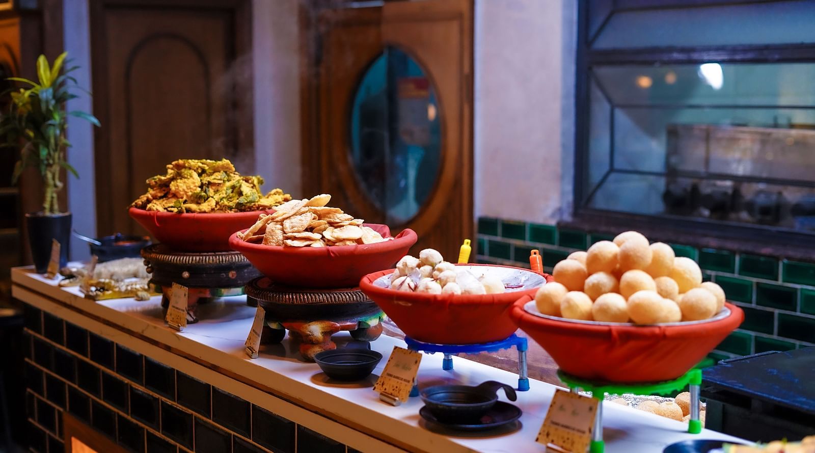 An image of a table with various kind of snacks placed - Themis Barbecue House