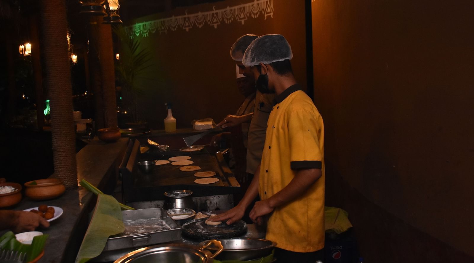 image of the live counter for the garden restaurant buffet at hoysala village resort in hassan