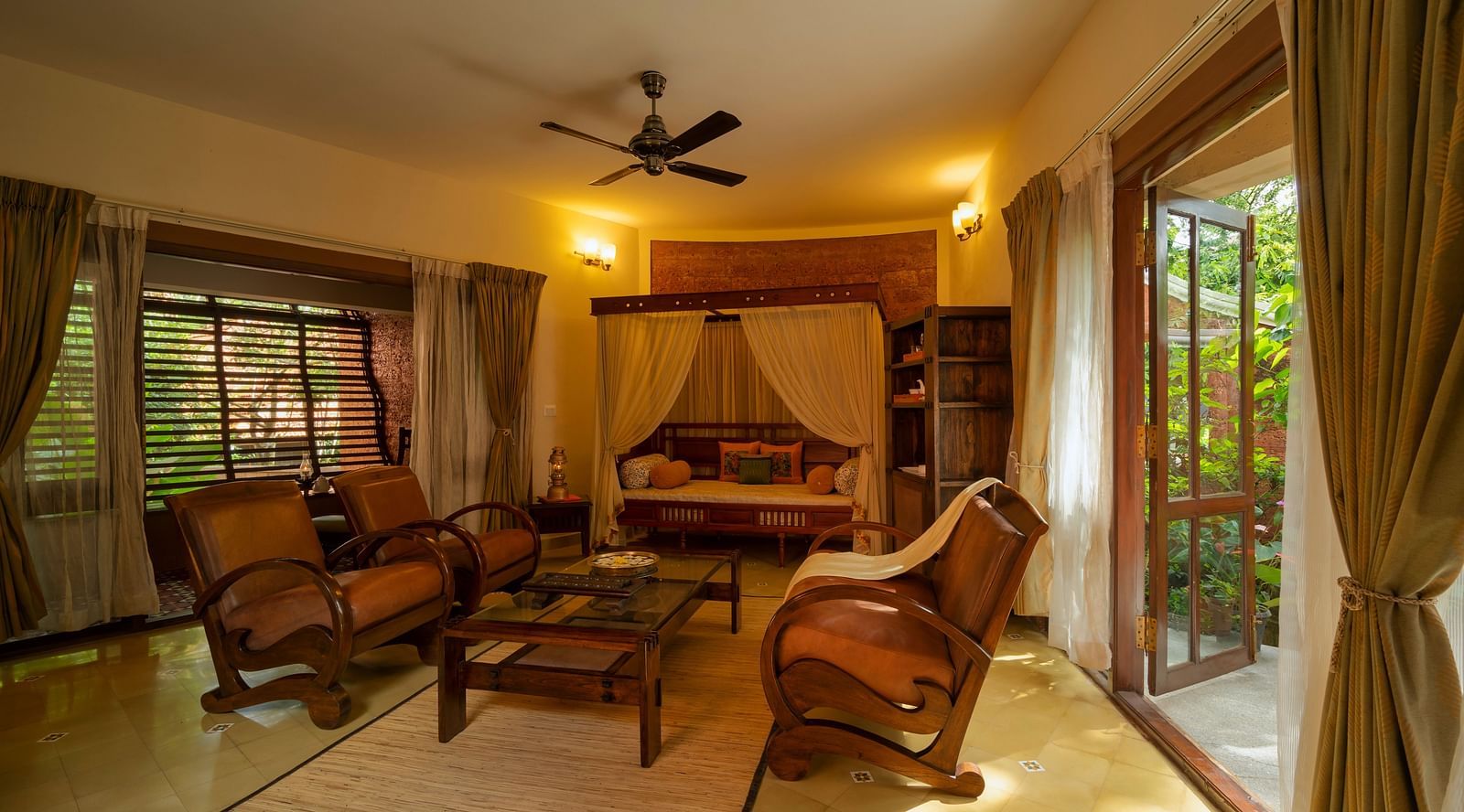 image of the living area of the luxury jacuzzi villa at hoysala village resort in hassan
