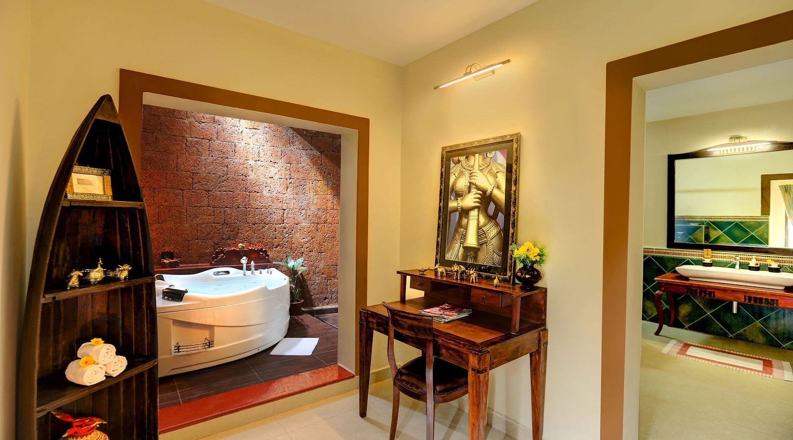 An image of room which gives a sneak peak of a bathroom that has a bathtub - Hoysala Village Resort, Hassan