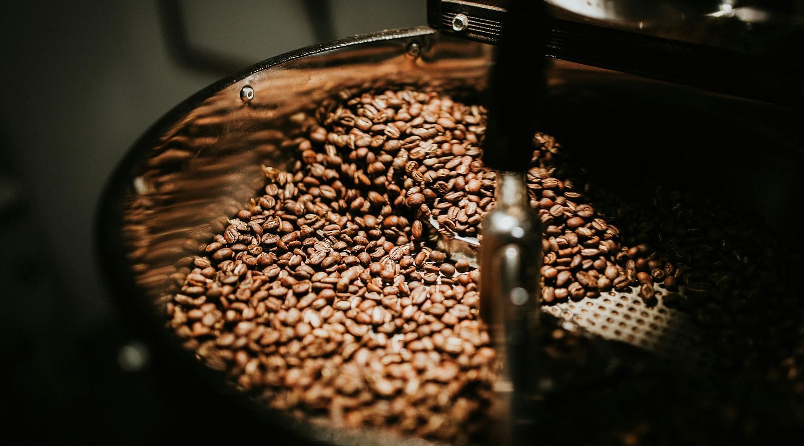 image of coffee beans being roasted and processed for the next steps