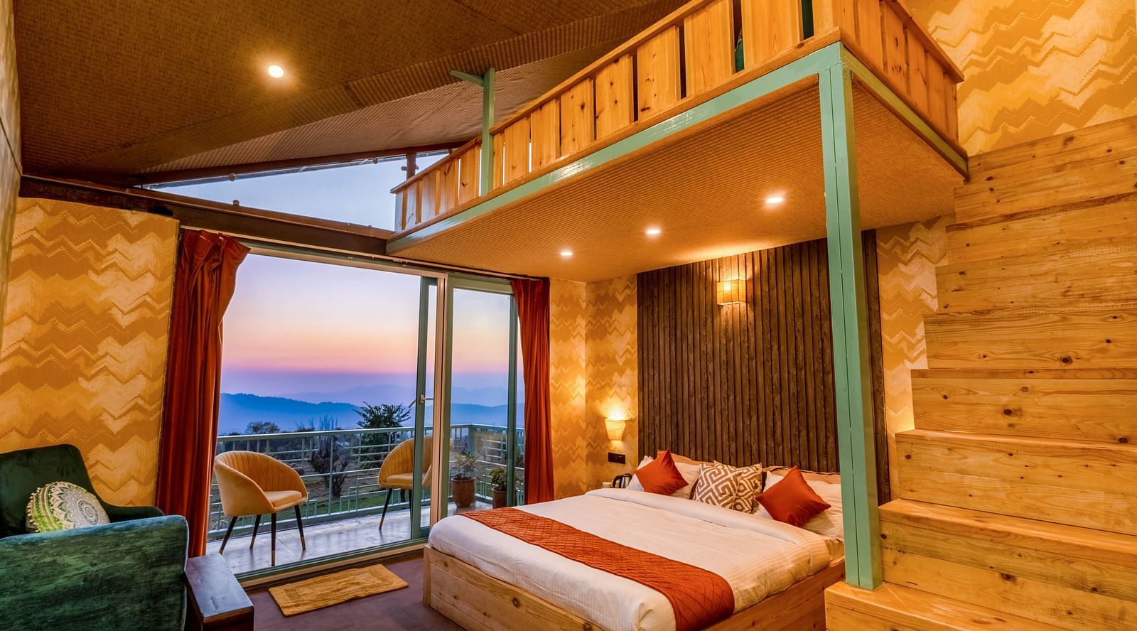 A room with a double bed and attic