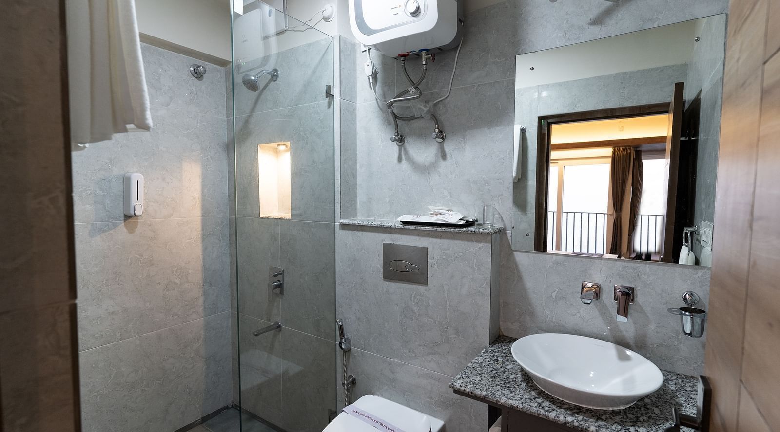 vanity area of deluxe bathroom at Mystique Valley Resort  