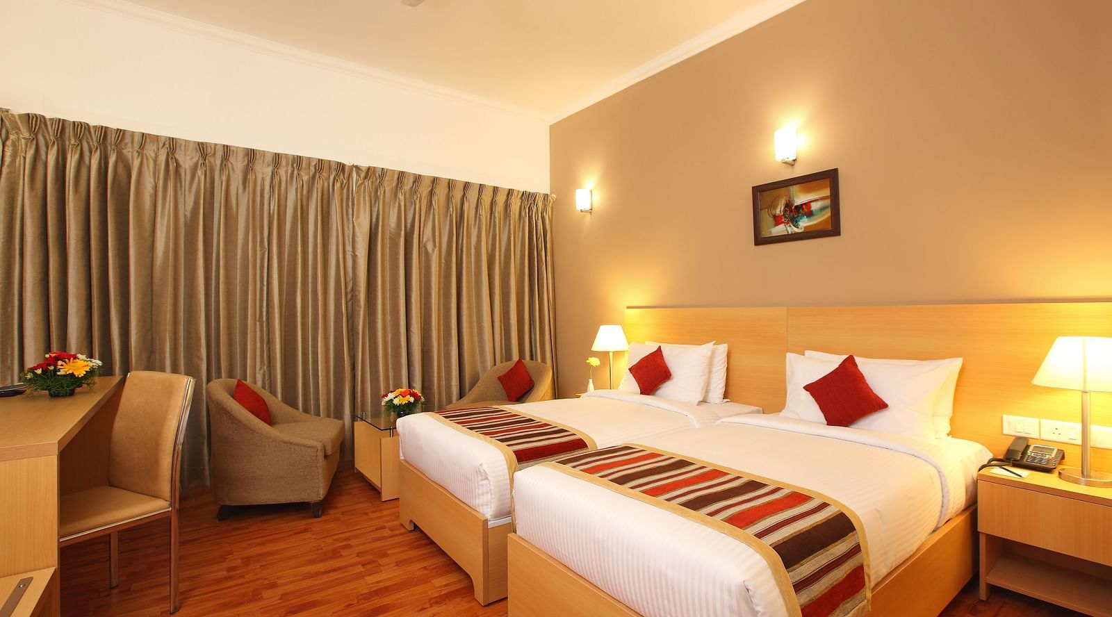 Twin beds inside Premium Room - Starlit Suites, Kochi