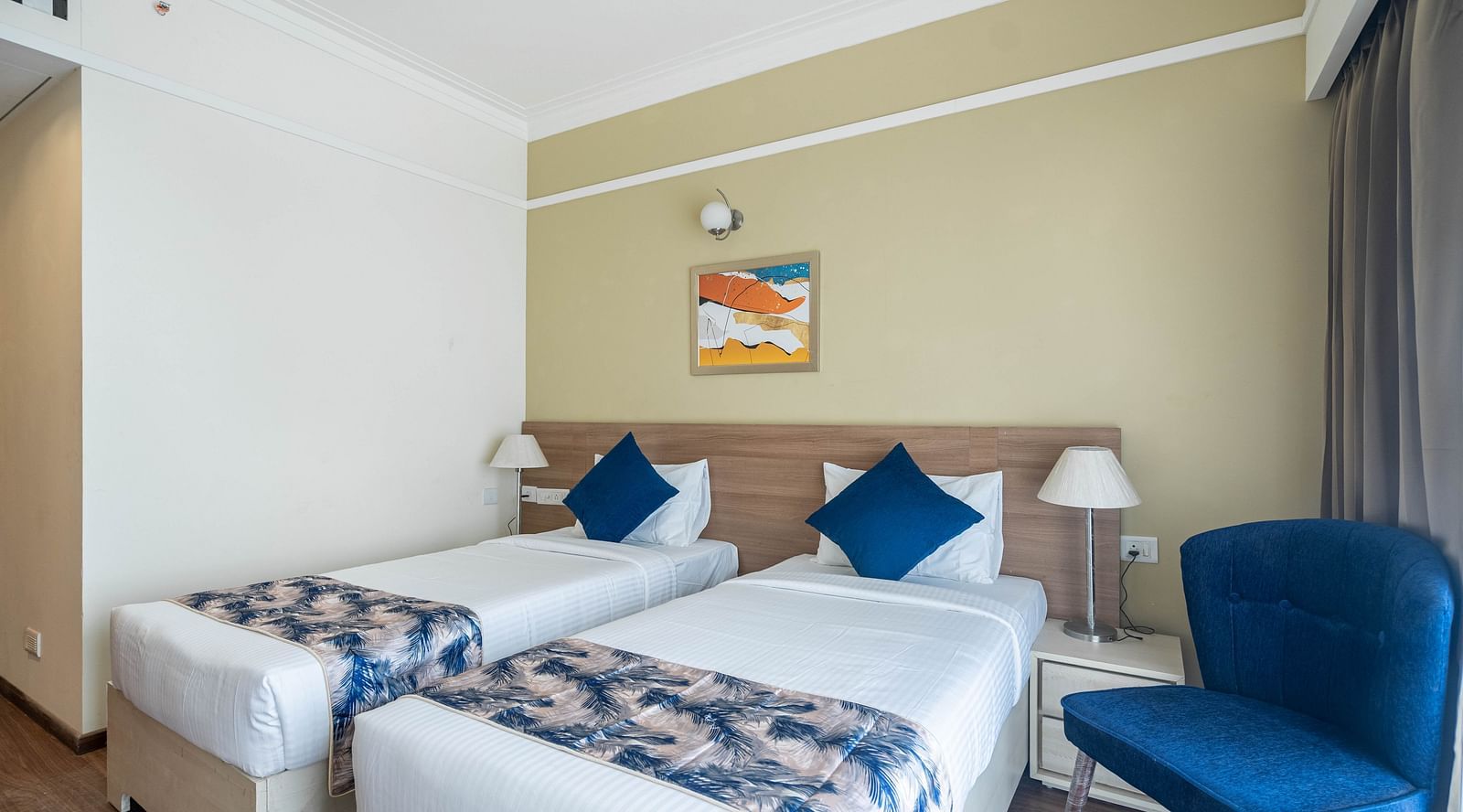 twin beds inside Premium Twin room - Starlit Suites Newtown, Kolkata