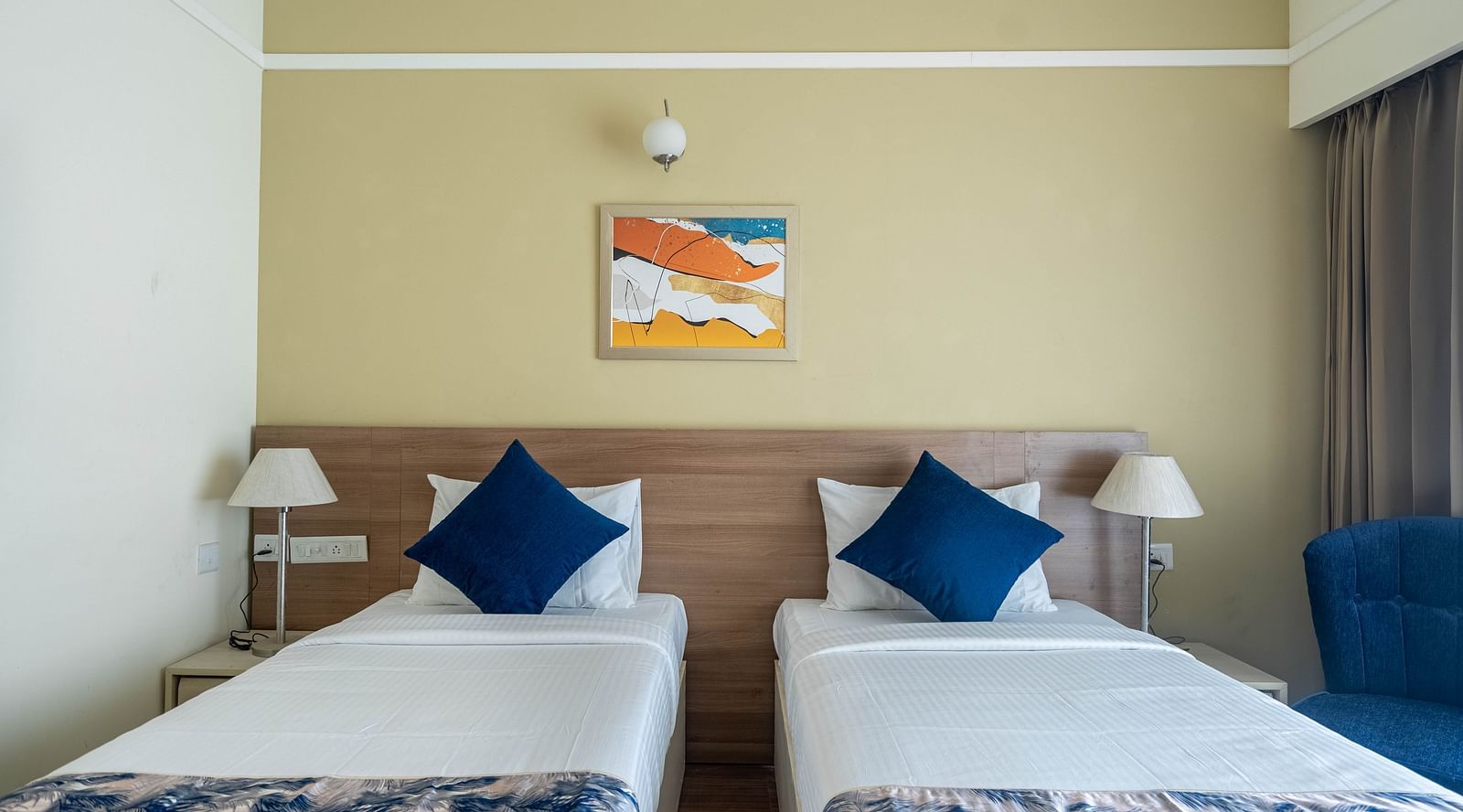 twin beds inside Premium Twin room - Starlit Suites Newtown, Kolkata