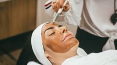 A woman receives facial therapy