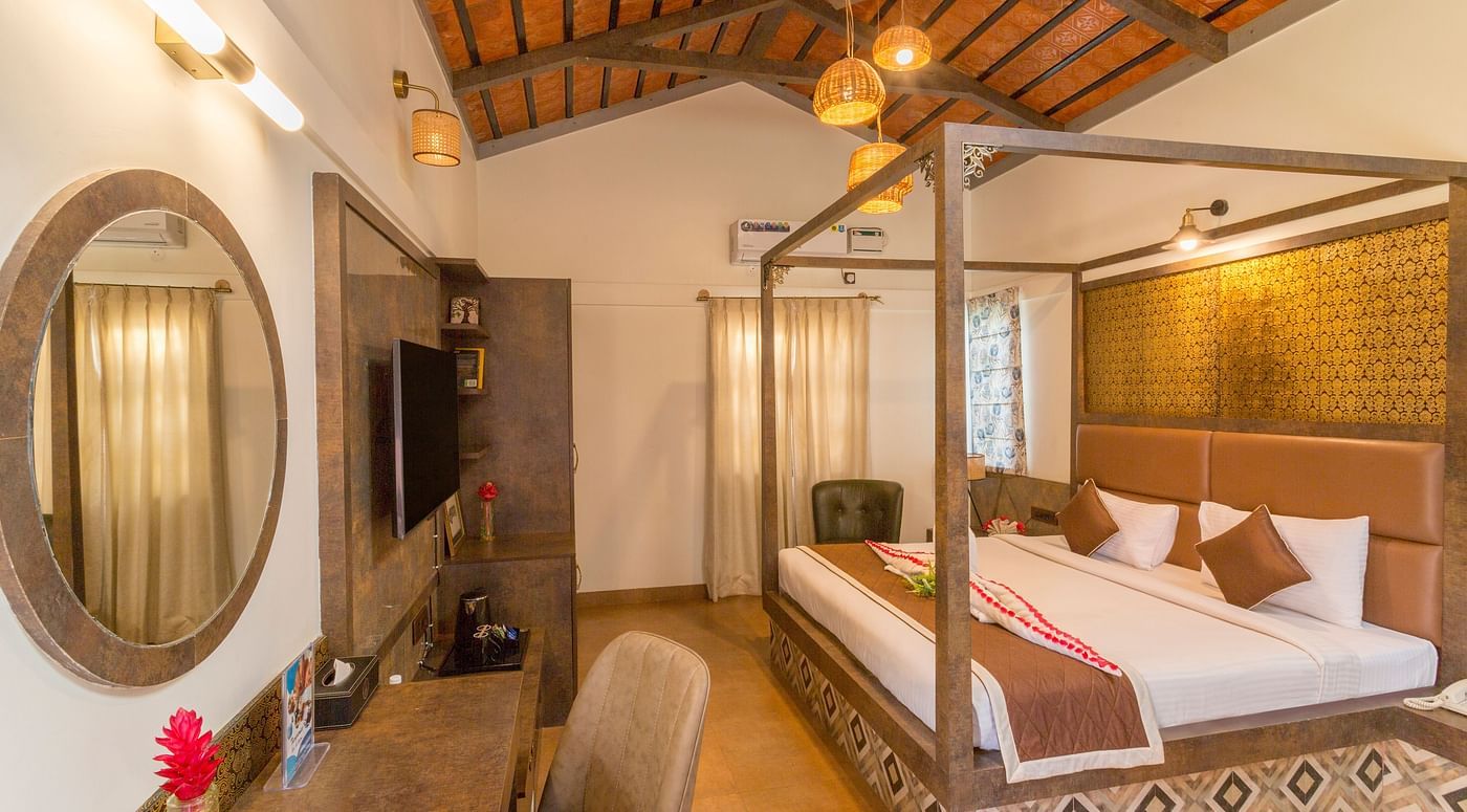 Premium room with traditional decor and cosy ambience at Nirantara Resort