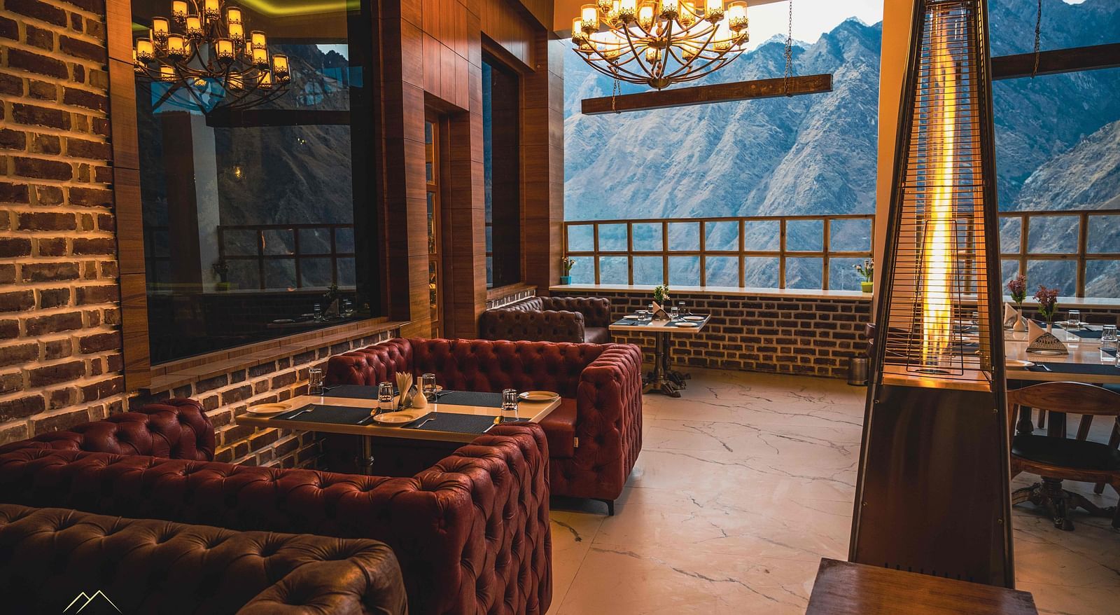 image of the alpenrose restaurant featuring an open mountain views during the day - the tattva boutique resort
