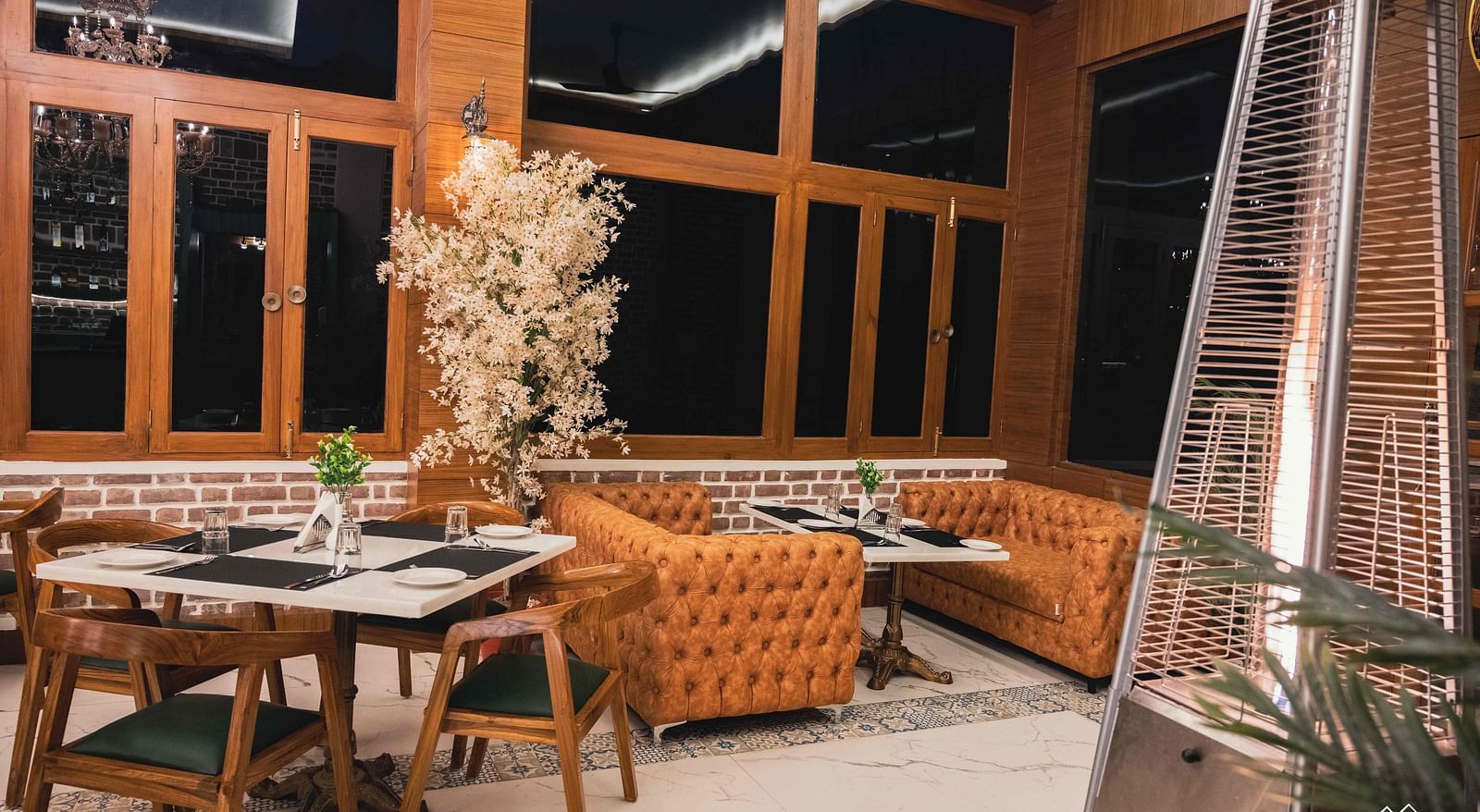 image of the indoor dining space of the alpenrose restaurant - the tattva boutique resort