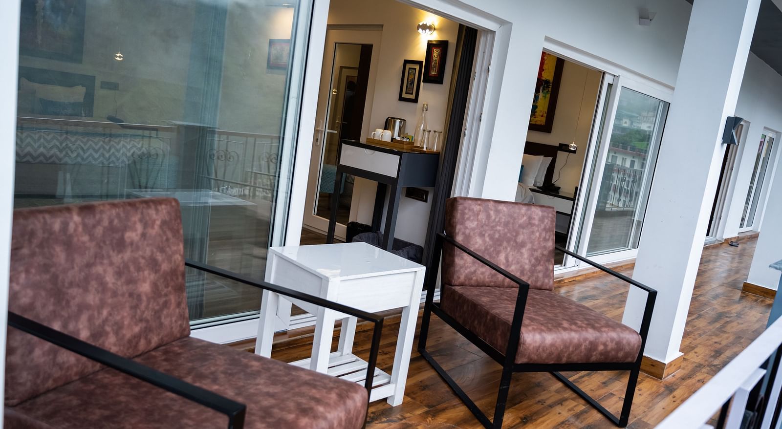 image of the outdoor seating area in the balcony of the pent house - The Tattva Boutique Resort