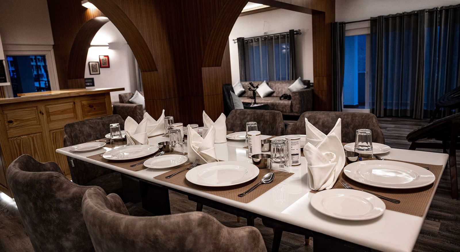 image of a wellset dining table in the pent house with cutlery and napkins - The Tattva Boutique Resort