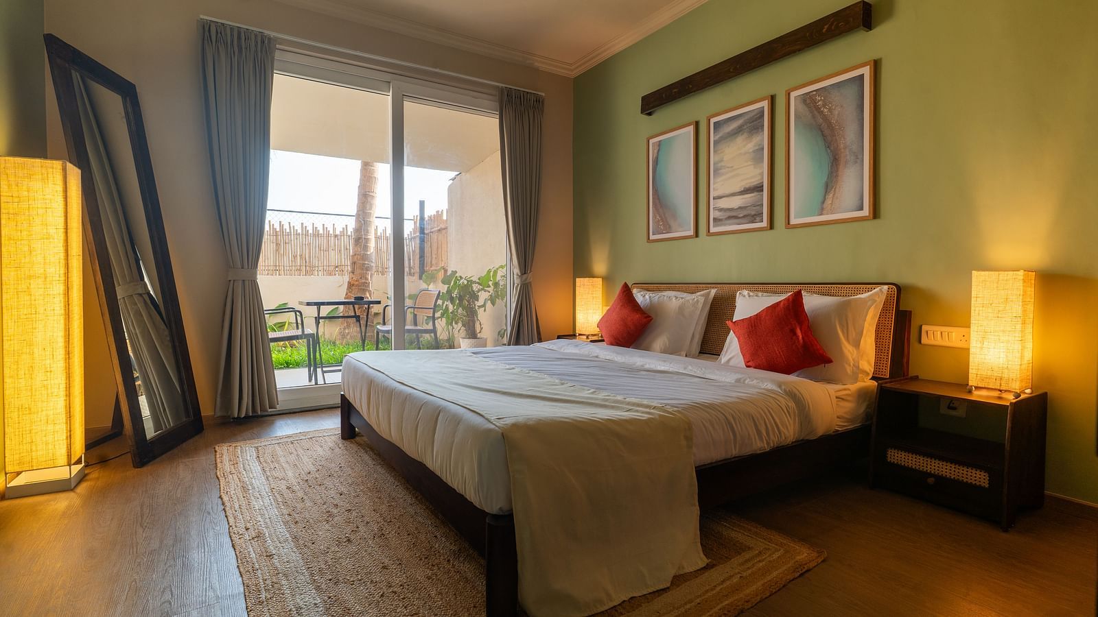 Bright and airy bedroom with double bed, contemporary decor, and access to balcony at Kssemya.